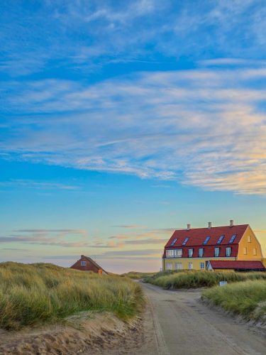 Western Denmark in winter a beautiful sunrise with iconic housing