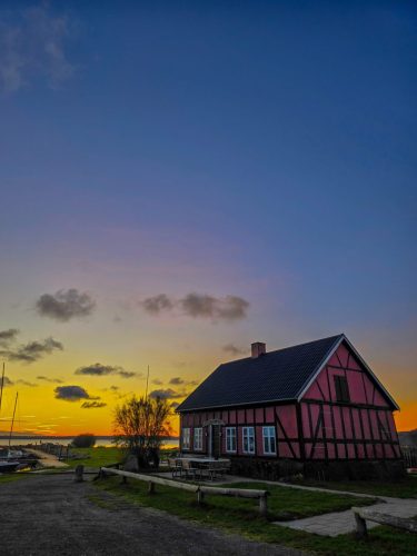 Sunset at the harbour and fishermans hut