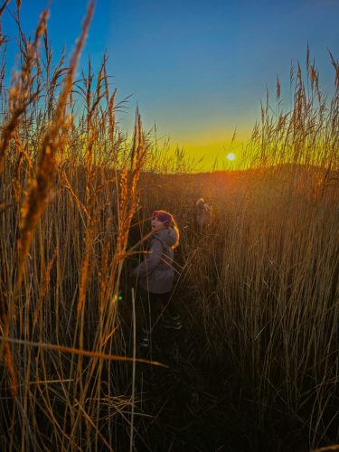 Sunset hike with kid having fun
