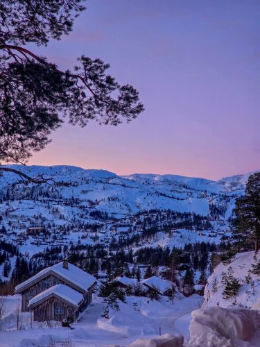 Cabin in the mountains of Norway in sunset